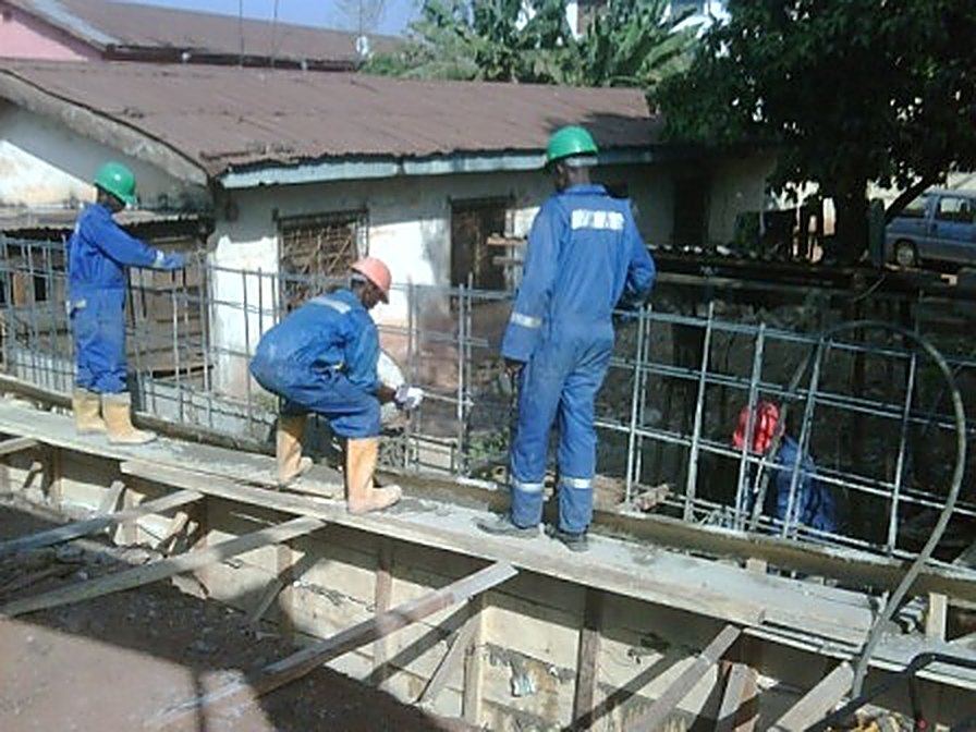 PLACING OF DRAINAGE SLAB IN PROGRESS